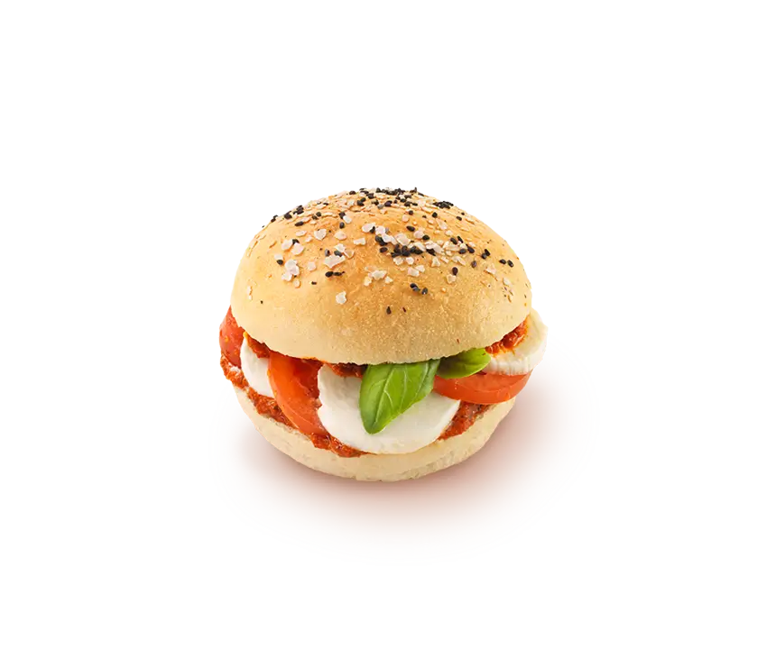Softes Weizenbrötchen, belegt mit Tomate, Mozzarella und hauseigener Tomatencreme