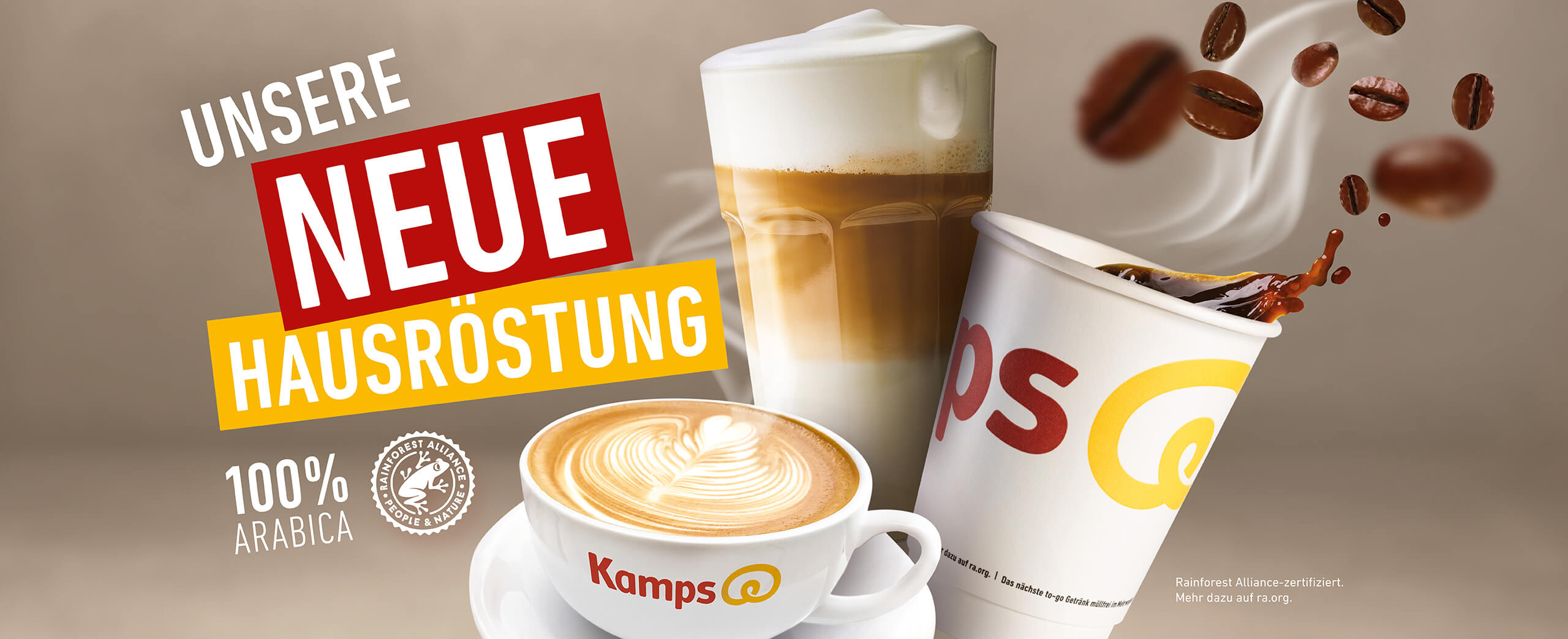 Header-Grafik mit dem Hinweis 100% Arabica, Rainforest Alliance Logo, dem Hinweis Rainforest Alliance zertifiziert und dem Schriftzug Unsere neue Hausröstung. Daneben ein Glas, eine Tasse und ein Becher mit Kamps Logos und Kamps Kaffeespezialitäten.